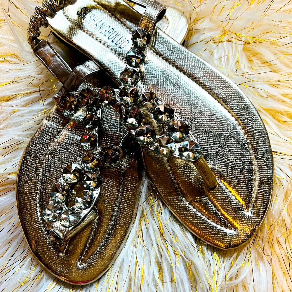 Flat gold sandals